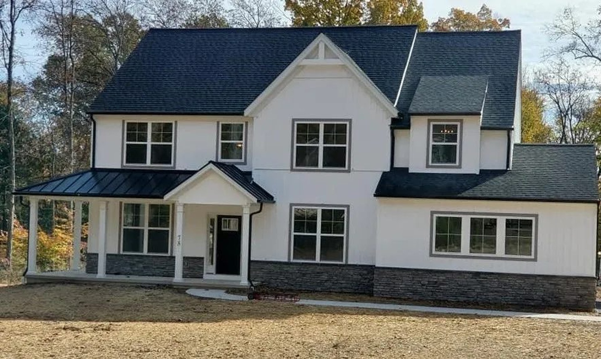 Zimrick custom home — white with metal porch